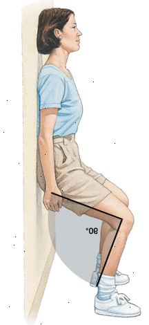Donna in piedi con la schiena contro il muro, scivolando muro con le ginocchia piegate a 90 gradi.