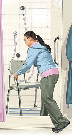 Donna che mette sedia doccia in doccia. Una maniglia di sostegno è sulla parete. La doccia è un ugello acqua palmare.